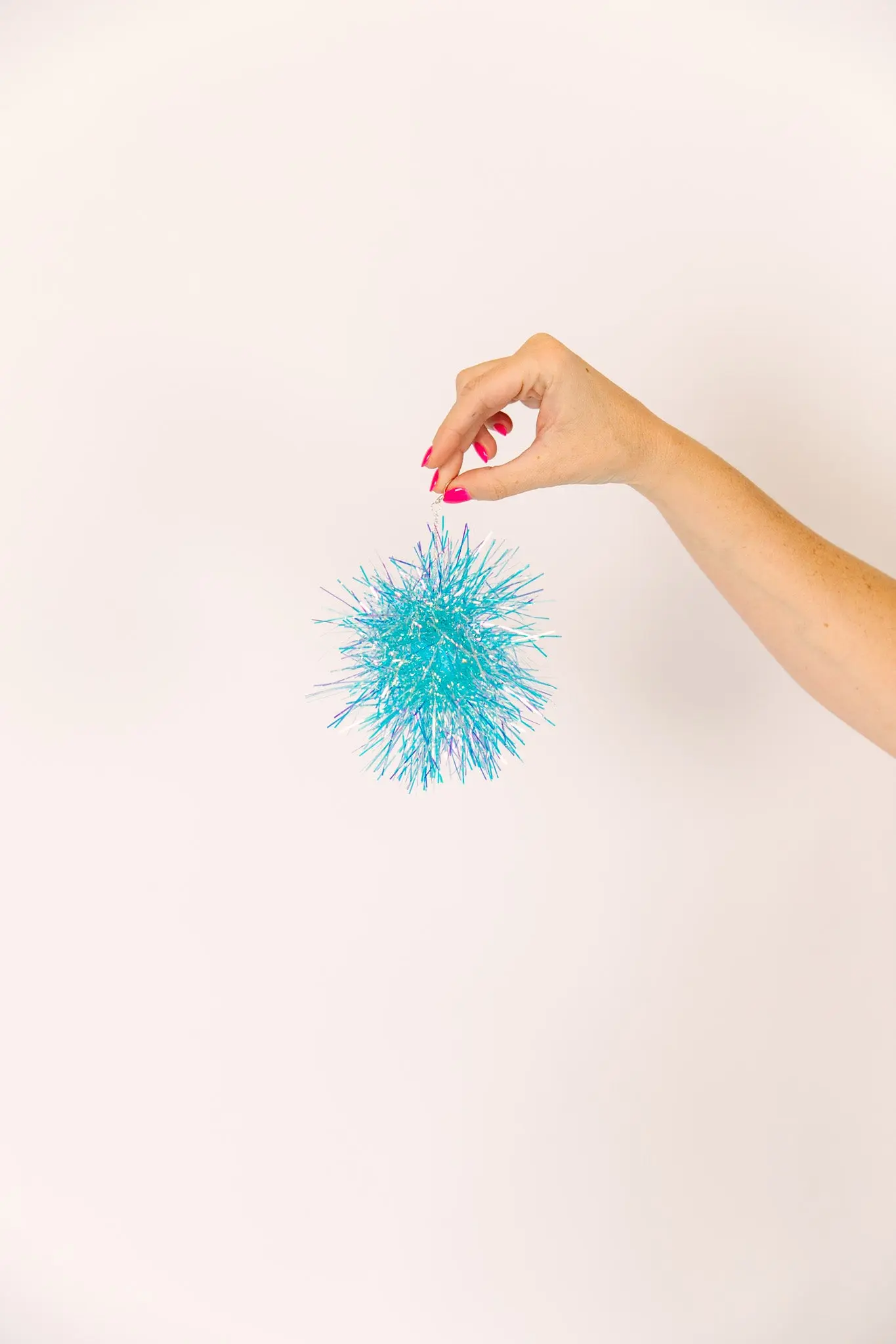 Blue Iridescent Party Pom Earrings - Image 3