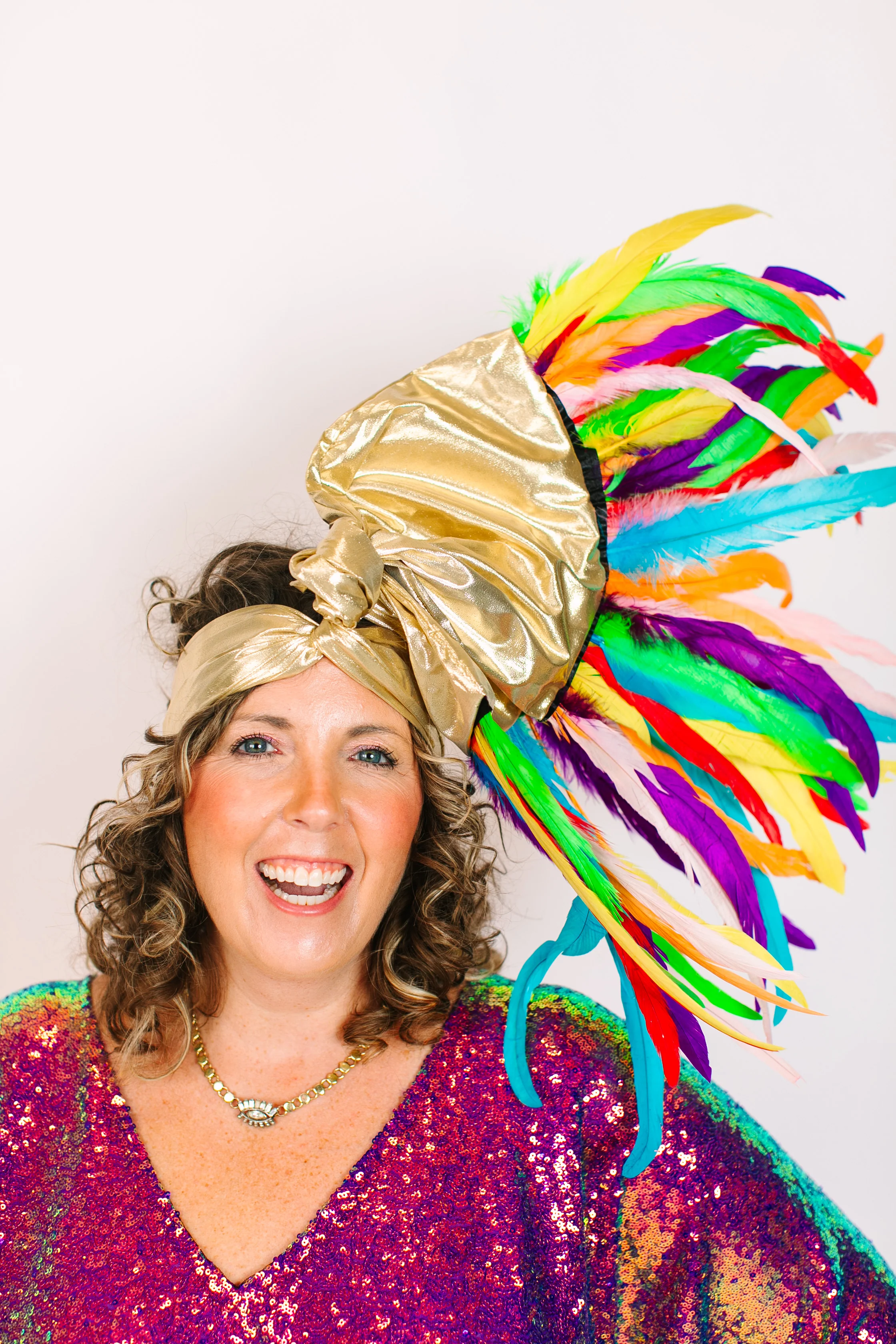 Gold Lame With Rainbow Feathers