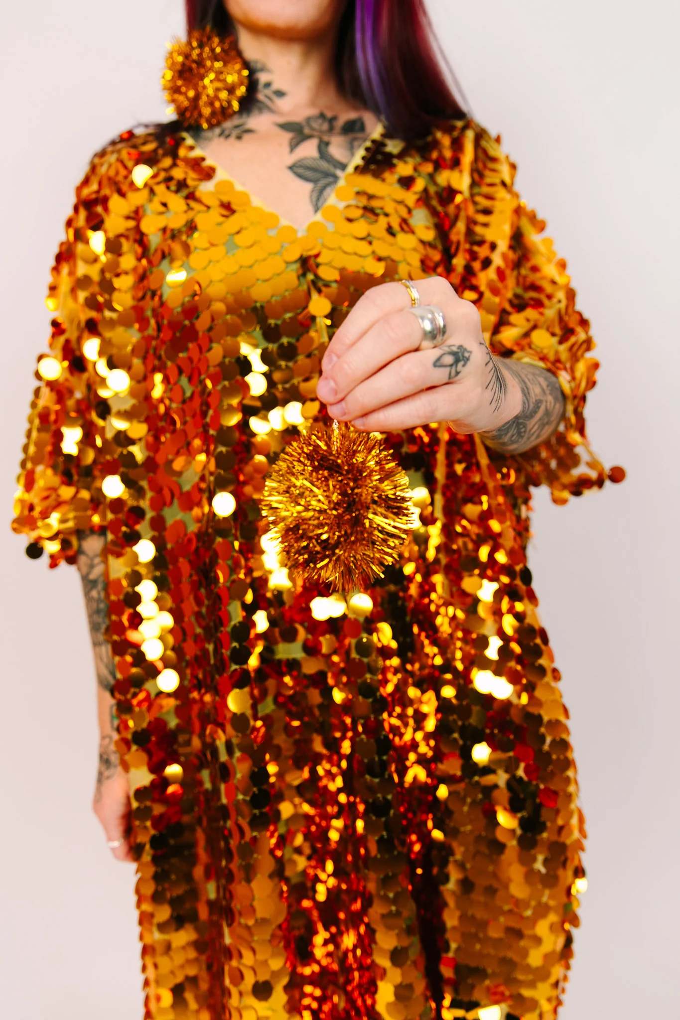 Gold Pom Pom Earrings - Image 3
