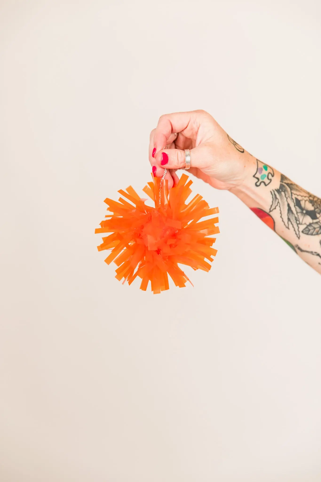 Orange Pom Pom Earrings - Image 6