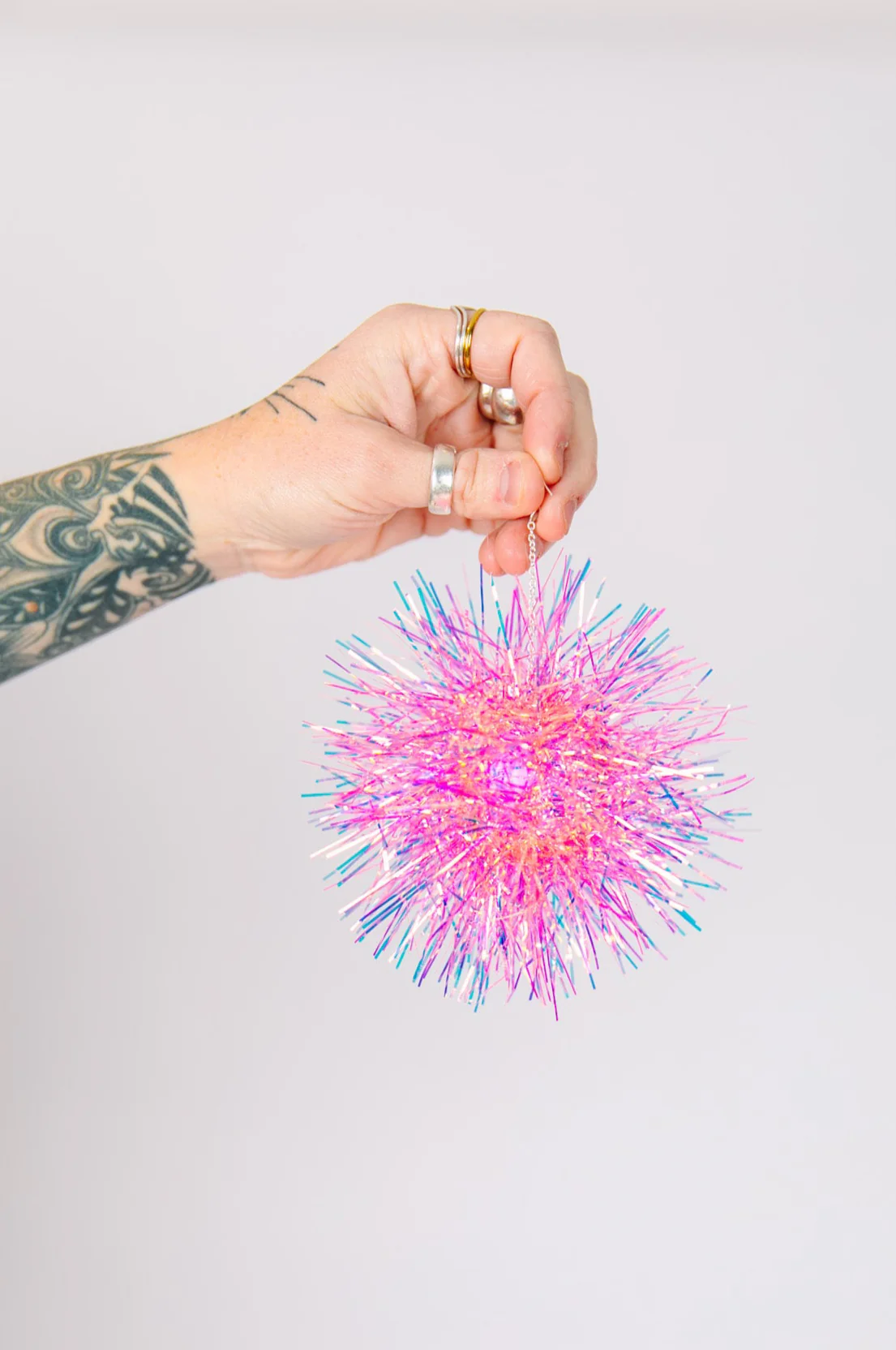 Pink Iridescent Party Pom Earrings - Image 2