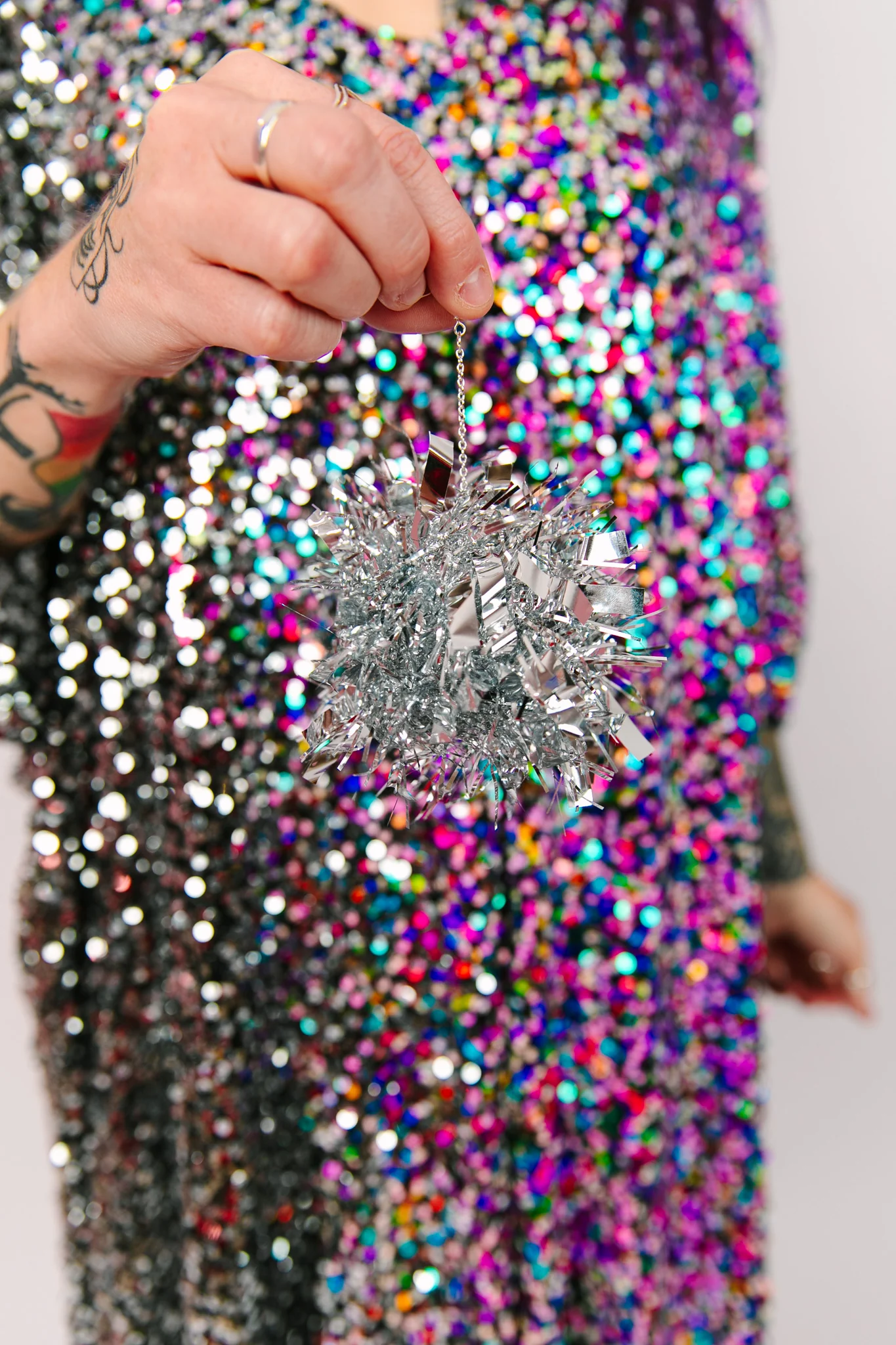 Silver Glitz Pom Pom Earrings - Image 2