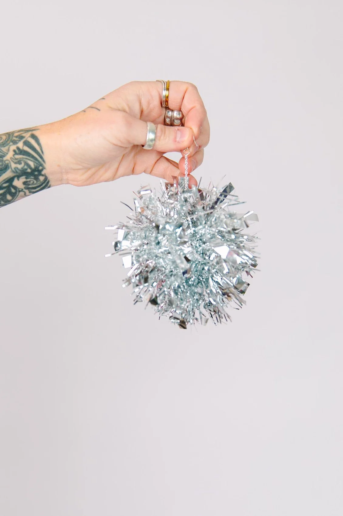 Silver Glitz Pom Pom Earrings - Image 4