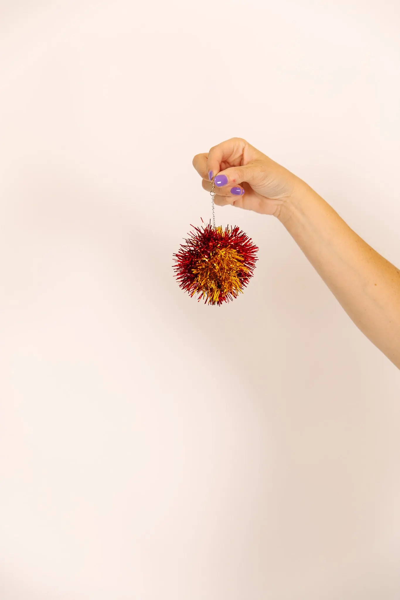 Red And Gold Pom Pom Earrings - Image 2